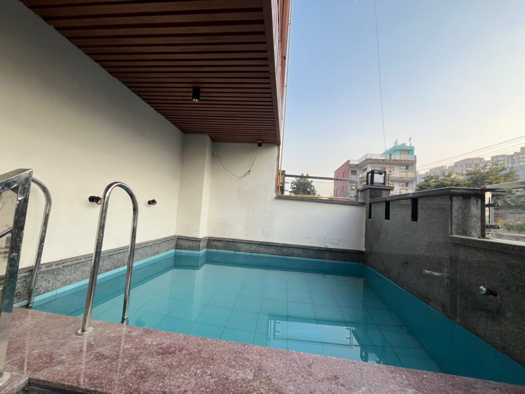 girls-luxury-pg-swimming-pool-greater-noida